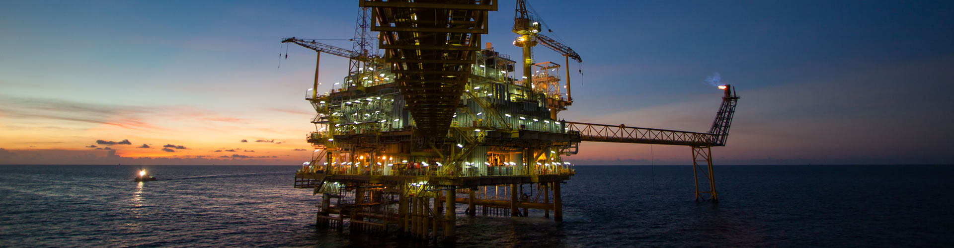 Oil platform in the sea at twilight